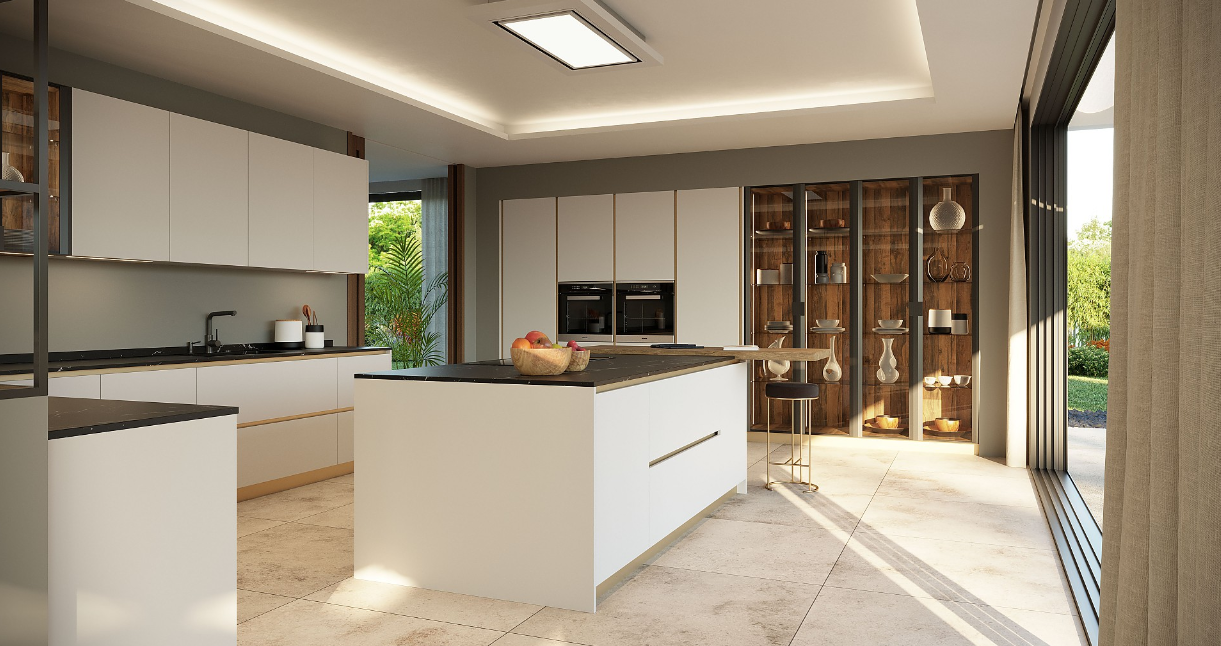 Cocina blanca con isla La luz y claridad destacan en este ambiente que evoca un estilo luminoso y moderno. A la hora de elegir un color para nuestra cocina, casi siempre pensamos en el blanco. El blanco es un color que potencia la luminosidad, da una gran sensación de amplitud, nunca pasará de moda y facilita la combinación con otros colores para la decoración de la estancia. La isla será el centro de tu cocina. Si disponemos de suficiente espacio en la estancia, disponer de una isla en el centro de la misma será un acierto. Su distribución permite movimientos cómodos alrededor de la misma y favorece la funcionalidad en la cocina.